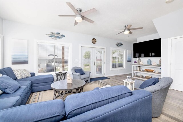 14060 Seminole Path, Lakeview, OH 43331 - living room featuring ceiling fan, wood finished floors, and french doors