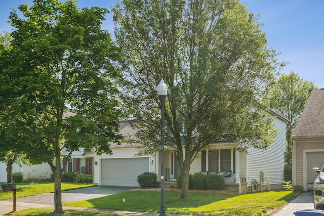 1118 Barlowe Run Dr, Blacklick, OH 43004 - obstructed view of property featuring a front lawn, asphalt driveway, and a shingled roof