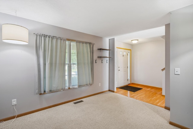 1118 Barlowe Run Dr, Blacklick, OH 43004 - foyer with carpet floors and baseboards