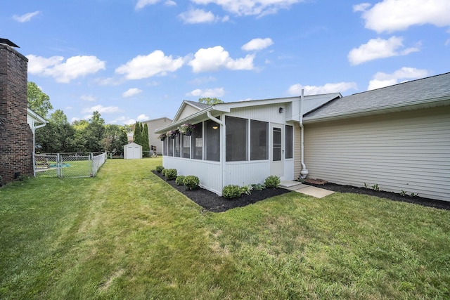 279 Old Coach Pl, Canal Winchester, OH 43110 - rear view of property with a sunroom and a storage shed