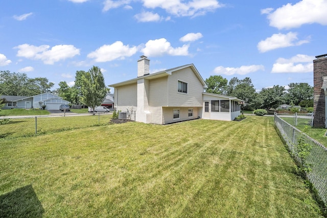 279 Old Coach Pl, Canal Winchester, OH 43110 - rear view of property featuring a sunroom, a chimney, and a fenced backyard