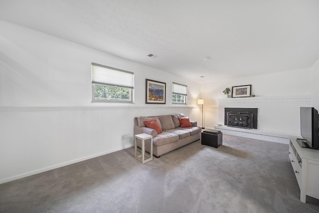 279 Old Coach Pl, Canal Winchester, OH 43110 - carpeted living area featuring a fireplace and baseboards