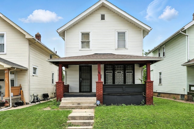 741 Heyl Ave, Columbus, OH 43206 - american foursquare style home with covered porch and a front lawn