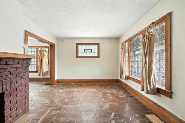741 Heyl Ave, Columbus, OH 43206 - spare room featuring a textured ceiling and baseboards