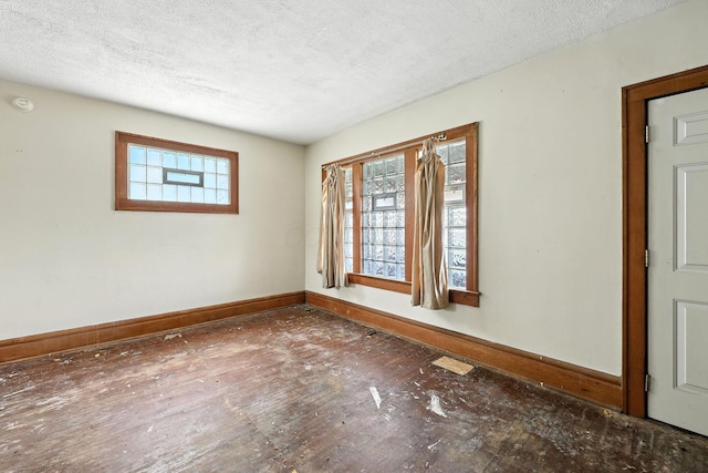 741 Heyl Ave, Columbus, OH 43206 - unfurnished room with a textured ceiling, a smoke detector, and wood finished floors