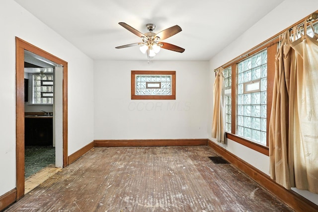 741 Heyl Ave, Columbus, OH 43206 - unfurnished room with hardwood / wood-style flooring, healthy amount of natural light, and ceiling fan