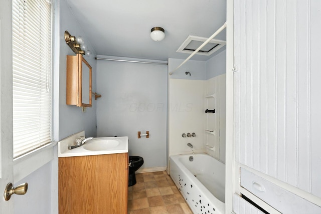 741 Heyl Ave, Columbus, OH 43206 - full bathroom featuring vanity, bathtub / shower combination, and stone finish flooring