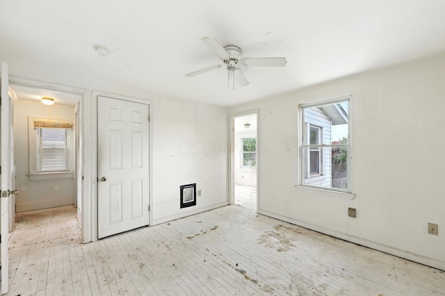 741 Heyl Ave, Columbus, OH 43206 - unfurnished living room featuring wood-type flooring and a ceiling fan