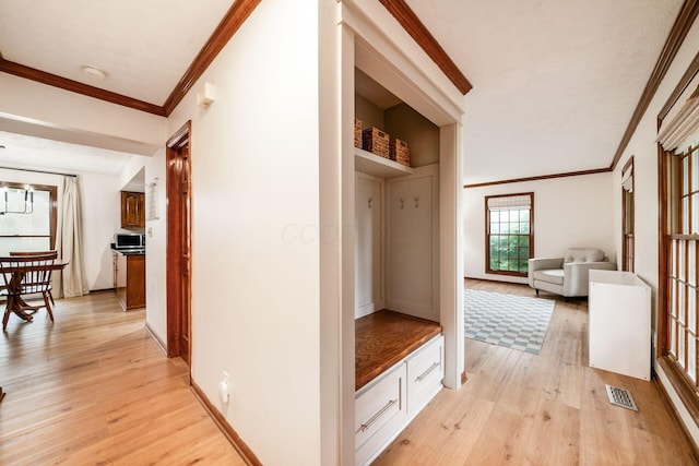 1169 Riva Ridge Blvd, Columbus, OH 43230 - mudroom with light wood finished floors and ornamental molding