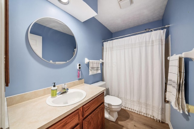 1169 Riva Ridge Blvd, Columbus, OH 43230 - bathroom featuring vanity, wood finished floors, and shower / bath combo with shower curtain