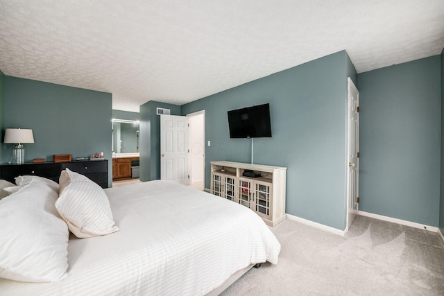 1169 Riva Ridge Blvd, Columbus, OH 43230 - bedroom with carpet floors, a textured ceiling, and ensuite bathroom