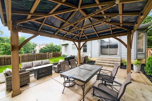 1169 Riva Ridge Blvd, Columbus, OH 43230 - fenced backyard featuring a gazebo, outdoor lounge area, entry steps, and a patio area