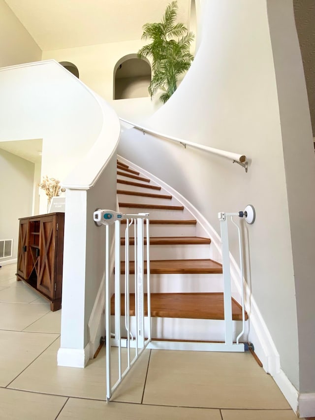 19 Ravine View Ct, Pataskala, OH 43062 - stairway with baseboards and tile patterned floors