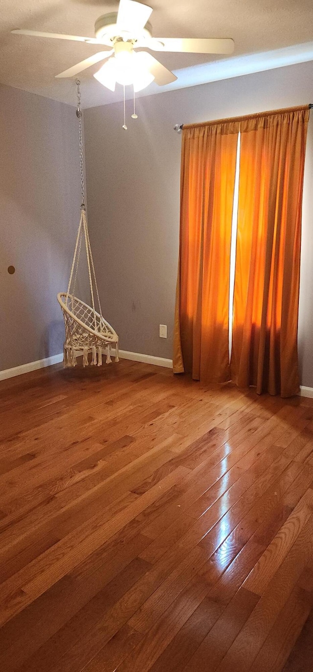 19 Ravine View Ct, Pataskala, OH 43062 - unfurnished room featuring hardwood / wood-style floors and a ceiling fan