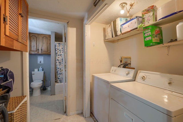 124 Wyandotte St, Lancaster, OH 43130 - laundry room with independent washer and dryer and light tile patterned floors