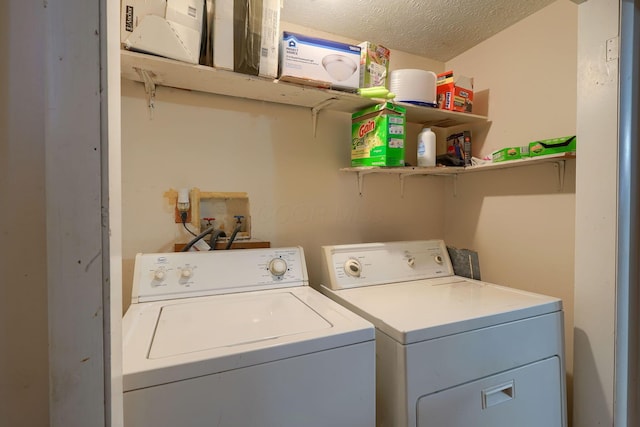 124 Wyandotte St, Lancaster, OH 43130 - laundry area with washing machine and dryer and a textured ceiling