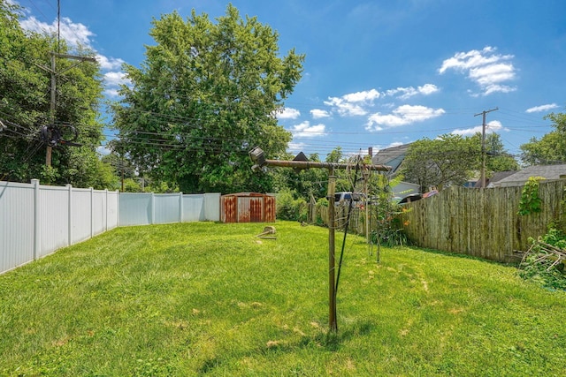 124 Wyandotte St, Lancaster, OH 43130 - fenced backyard with a storage unit