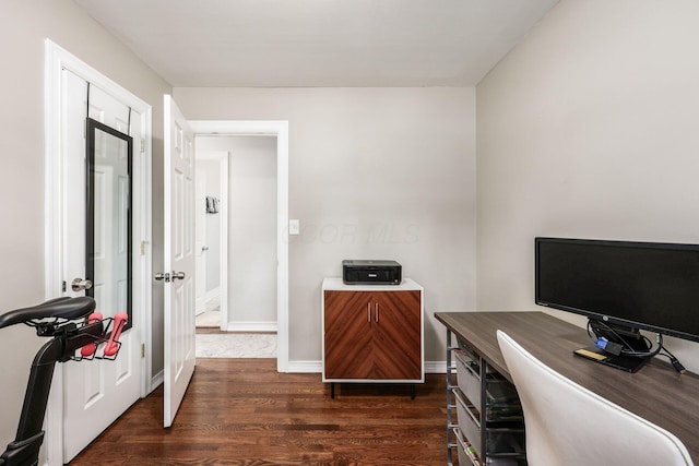 2486 Cranford Rd, Columbus, OH 43221 - home office with dark wood-type flooring and baseboards