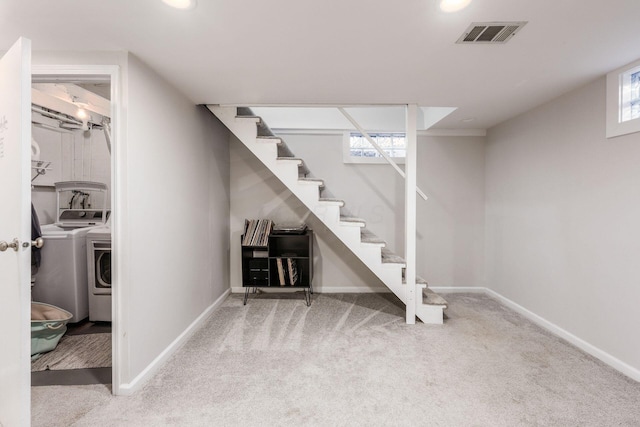2486 Cranford Rd, Columbus, OH 43221 - below grade area featuring washer and clothes dryer, carpet, stairway, and recessed lighting