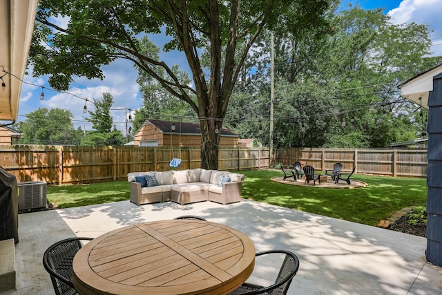 2486 Cranford Rd, Columbus, OH 43221 - fenced backyard with a patio and an outdoor living space with a fire pit