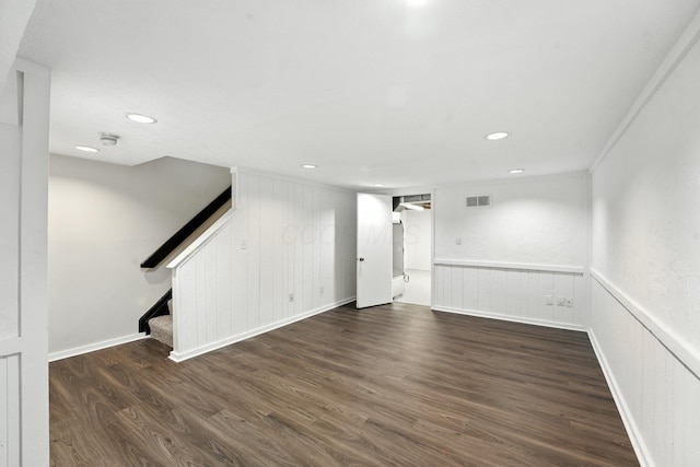 2663 Cedar Lake Dr, Dublin, OH 43016 - finished basement with wood finished floors, stairway, a wainscoted wall, recessed lighting, and a decorative wall