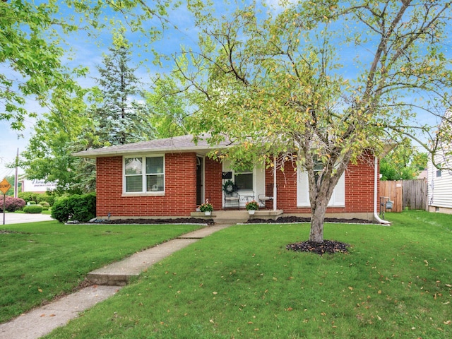 1410 Chelmsford Sq S, Columbus, OH 43229 - view of front of home featuring brick siding and covered porch