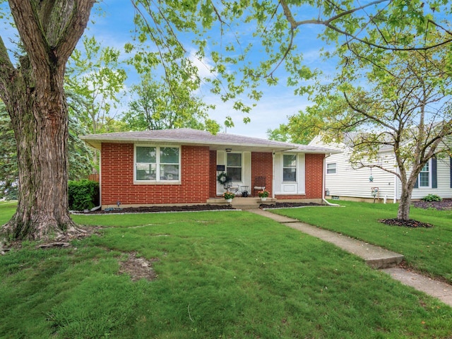 1410 Chelmsford Sq S, Columbus, OH 43229 - single story home featuring brick siding and a front yard