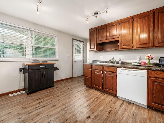 1410 Chelmsford Sq S, Columbus, OH 43229 - kitchen featuring white dishwasher, rail lighting, light wood-type flooring, dark countertops, and brown cabinets