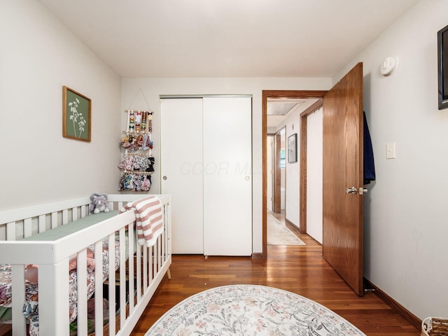 1410 Chelmsford Sq S, Columbus, OH 43229 - bedroom with wood finished floors and a closet