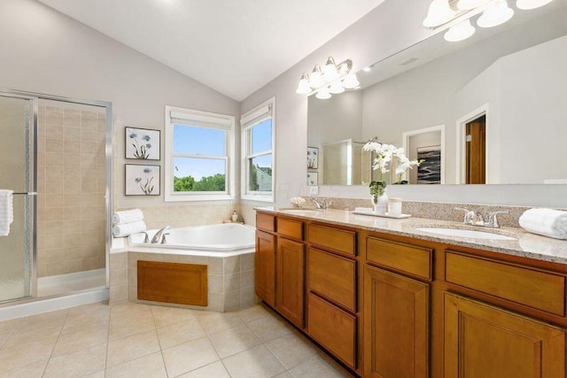 7125 Marrisey Loop, Galena, OH 43021 - bathroom with a shower stall, double vanity, tile patterned flooring, a garden tub, and lofted ceiling