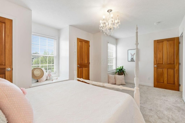 7125 Marrisey Loop, Galena, OH 43021 - bedroom featuring carpet floors, multiple windows, and a chandelier