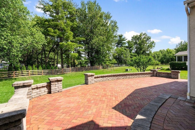 7125 Marrisey Loop, Galena, OH 43021 - fenced backyard with a patio area and view of wooded area