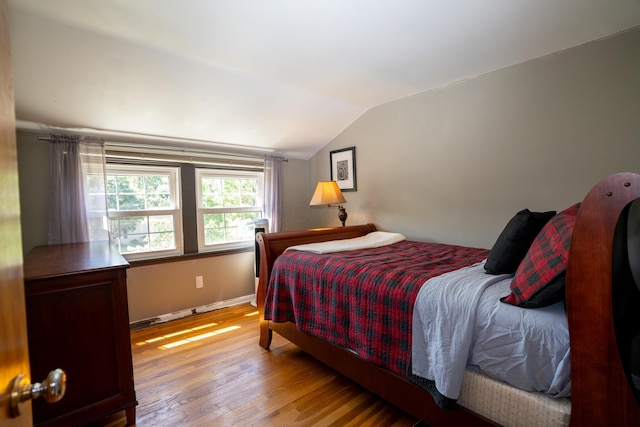 4754 Amesbury Way, Columbus, OH 43228 - bedroom with lofted ceiling and wood finished floors
