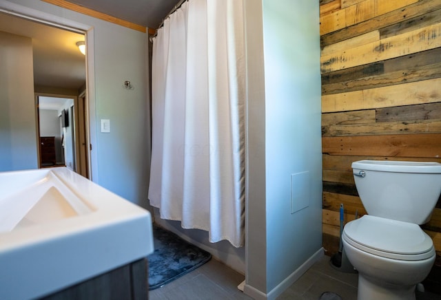 4754 Amesbury Way, Columbus, OH 43228 - bathroom with wood walls, vanity, and tile patterned flooring