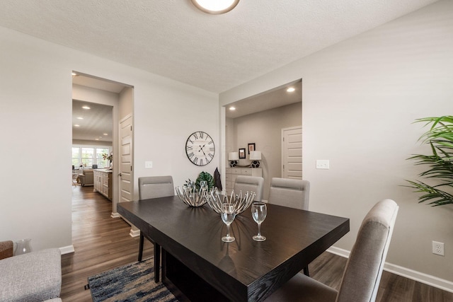 3031 Sinatra Way, Powell, OH 43065 - dining area featuring dark wood-style flooring and recessed lighting