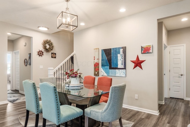 3031 Sinatra Way, Powell, OH 43065 - dining space featuring wood finished floors, stairs, a chandelier, and recessed lighting