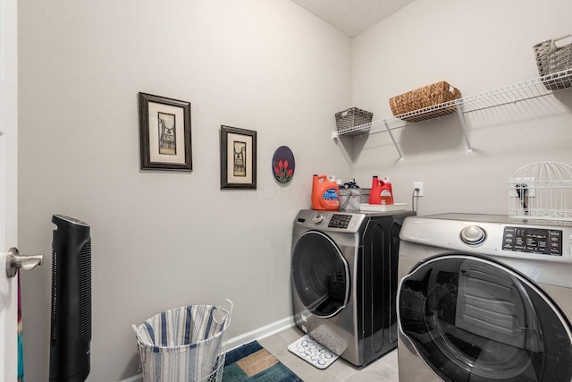 3031 Sinatra Way, Powell, OH 43065 - laundry room with washer and dryer and light tile patterned flooring