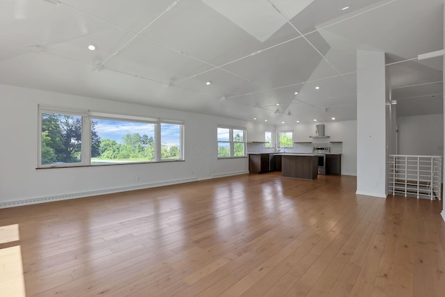 7688 State Route 257, Prospect, OH 43342 - unfurnished living room with recessed lighting and light wood-type flooring