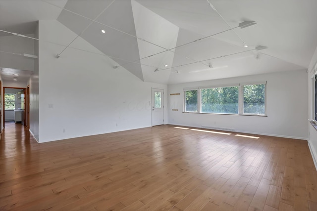 7688 State Route 257, Prospect, OH 43342 - spare room with high vaulted ceiling and wood finished floors
