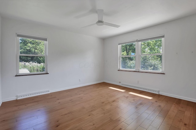 7688 State Route 257, Prospect, OH 43342 - spare room featuring baseboard heating, healthy amount of natural light, and ceiling fan