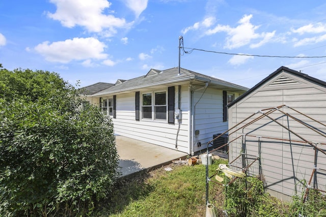 7688 State Route 257, Prospect, OH 43342 - view of side of home featuring a patio area