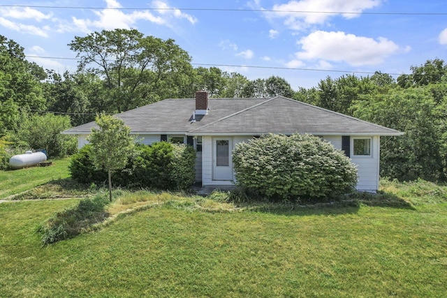 7688 State Route 257, Prospect, OH 43342 - view of front of house with a chimney and a front lawn