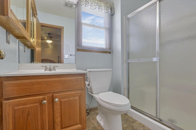 201 Christopher Ct, Hebron, OH 43025 - bathroom featuring a shower with door, vanity, and a ceiling fan