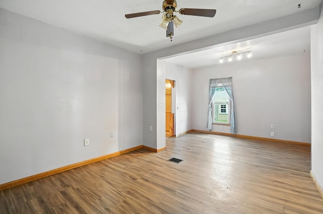 99 N Williams St, Newark, OH 43055 - empty room with wood finished floors and ceiling fan