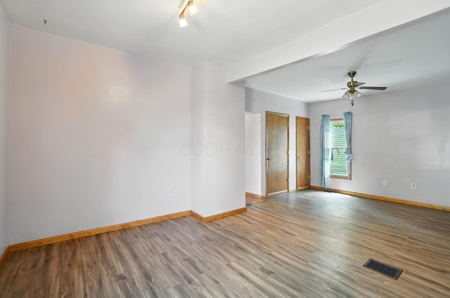 99 N Williams St, Newark, OH 43055 - empty room with wood finished floors and a ceiling fan