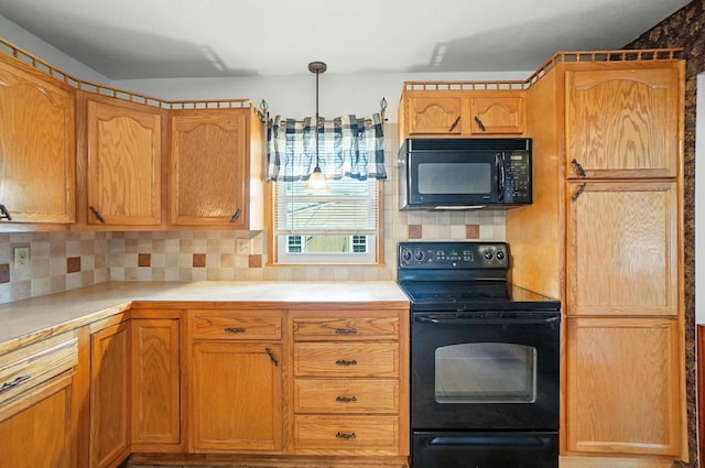 99 N Williams St, Newark, OH 43055 - kitchen with black appliances, backsplash, light countertops, and decorative light fixtures