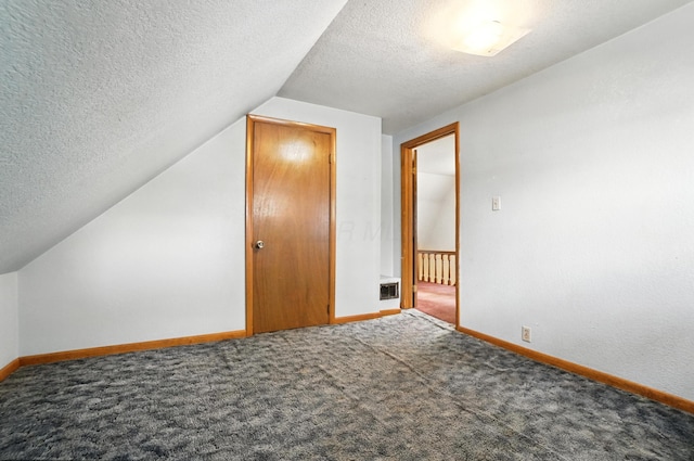 99 N Williams St, Newark, OH 43055 - bonus room with a textured ceiling, vaulted ceiling, and carpet