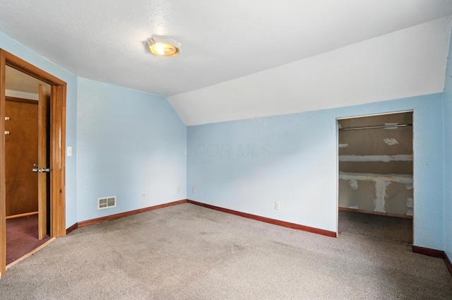 99 N Williams St, Newark, OH 43055 - additional living space with carpet flooring and lofted ceiling