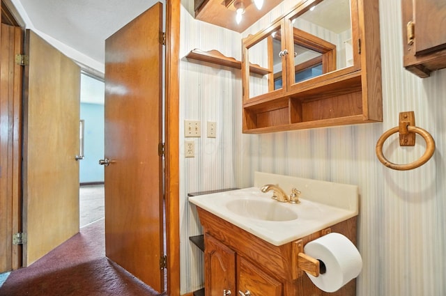 99 N Williams St, Newark, OH 43055 - bathroom featuring wallpapered walls and vanity