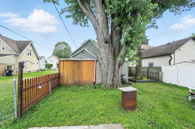 99 N Williams St, Newark, OH 43055 - fenced backyard featuring a shed and a residential view